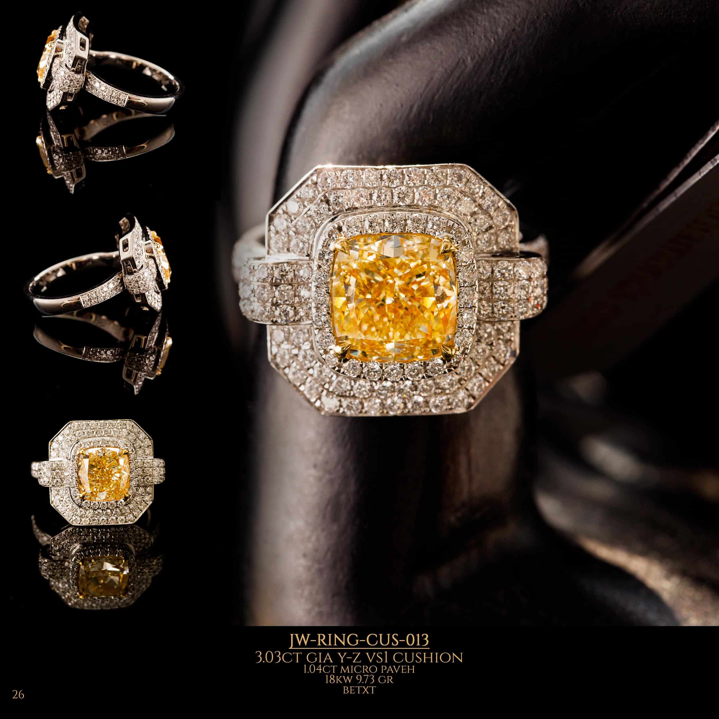Shooting from different angles of diamond ring with large GIA Y-Z VS1 cushion diamonds in the center