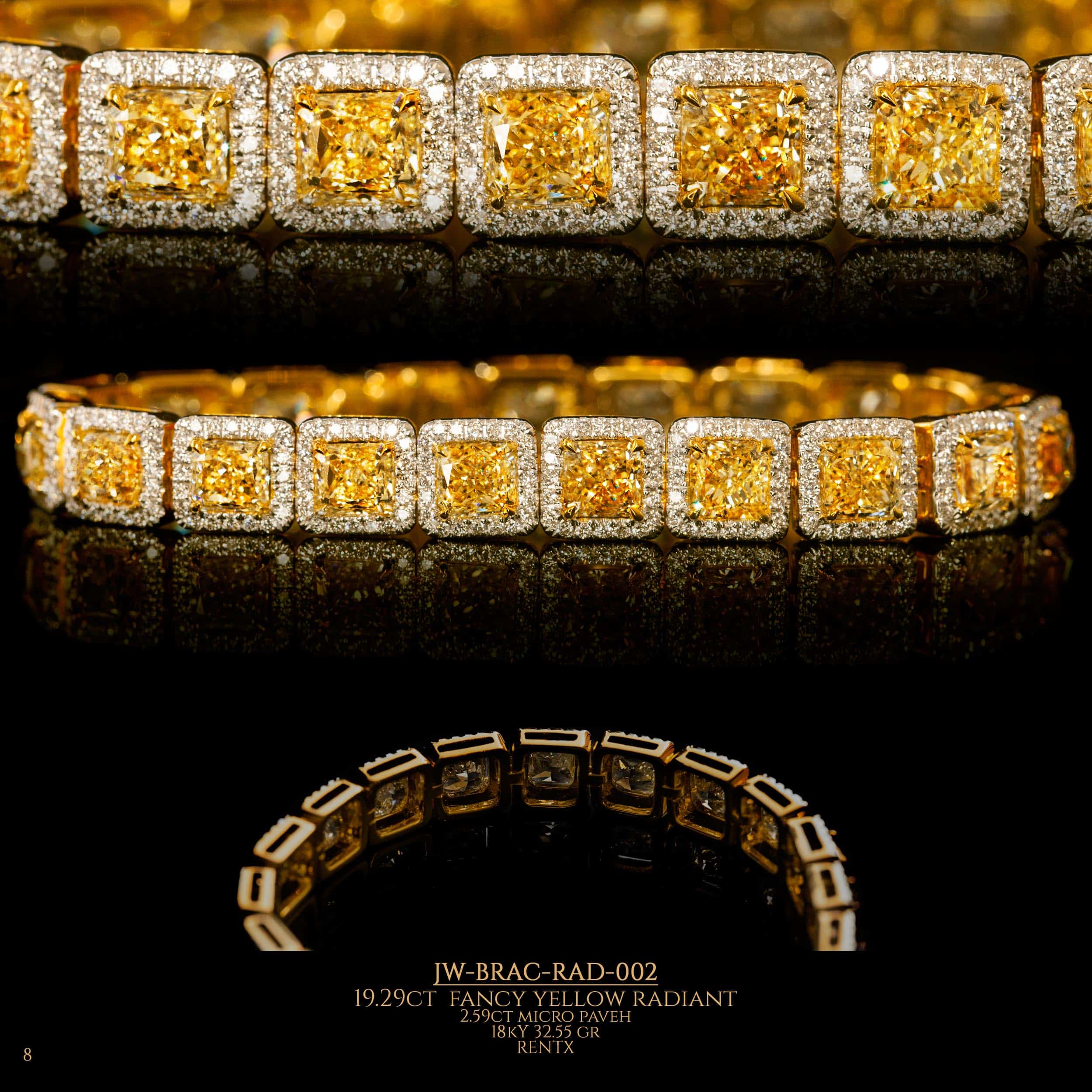 Different shooting angle to closed diamond bracelet with large yellow diamonds surrounded by regular diamonds in the shape of a radiant