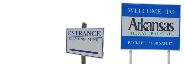 The entrance sign to Arkansas