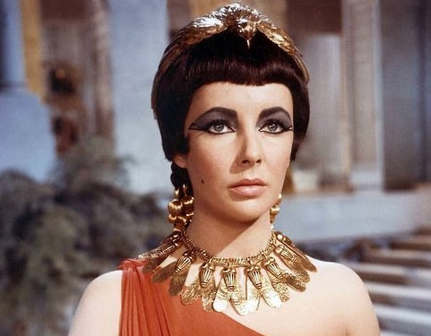 Elizabeth Taylor, wearing fashion jewelry by Joseff of Hollywood, in a role as Cleopatra, in the movie of the same name.
