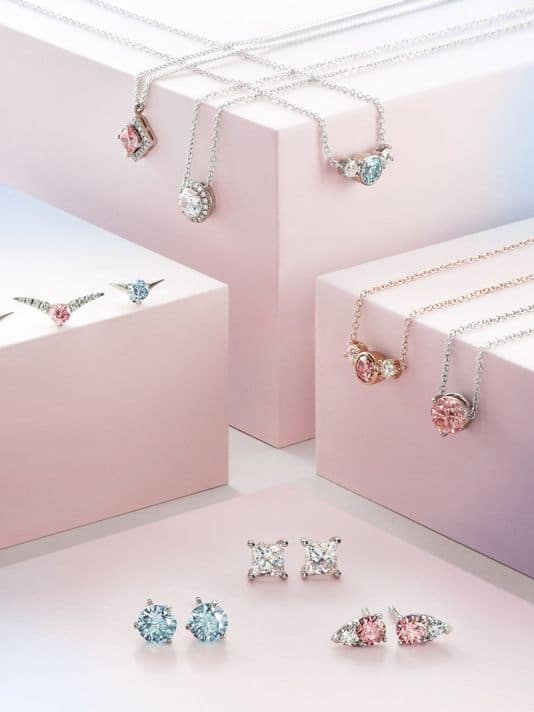 A variety of items by Lightbox Jewellery, featuring white and fancy color synthetic diamonds, produced by De Beers’ Element Six subsidiary.