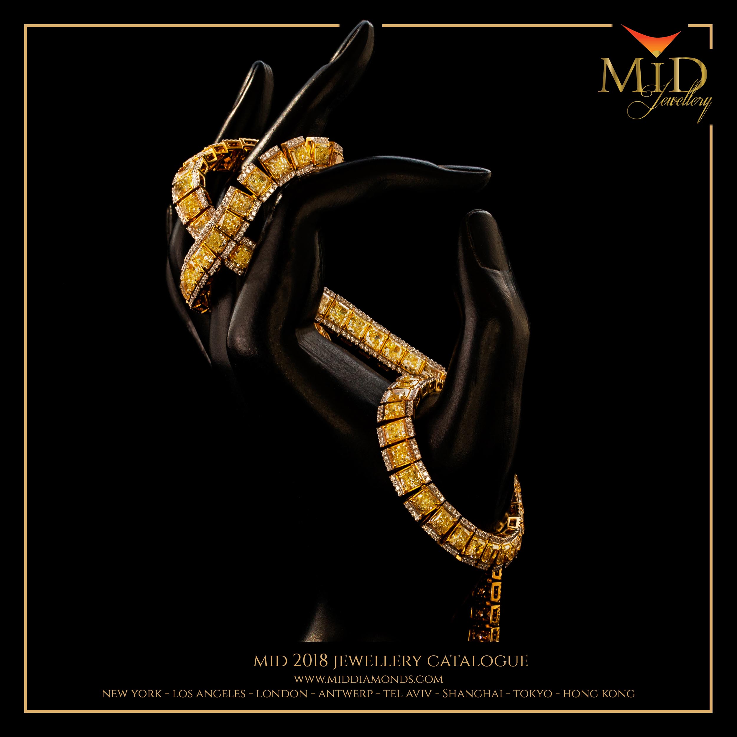 cover image of bracelet with fancy yellow diamonds wrapped over the fingers of a doll's hand.