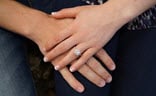 engagement ring on hands
