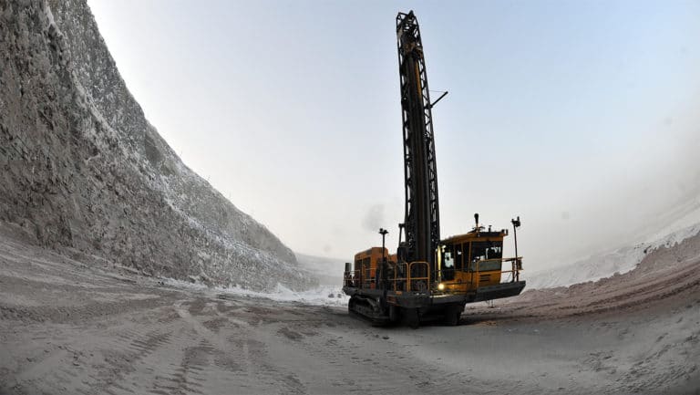 A remote-controlled drilling rig at Alrosa’s Jubilee open-pit mine in Yakutia