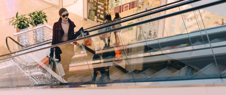 A woman is shopping in a mall