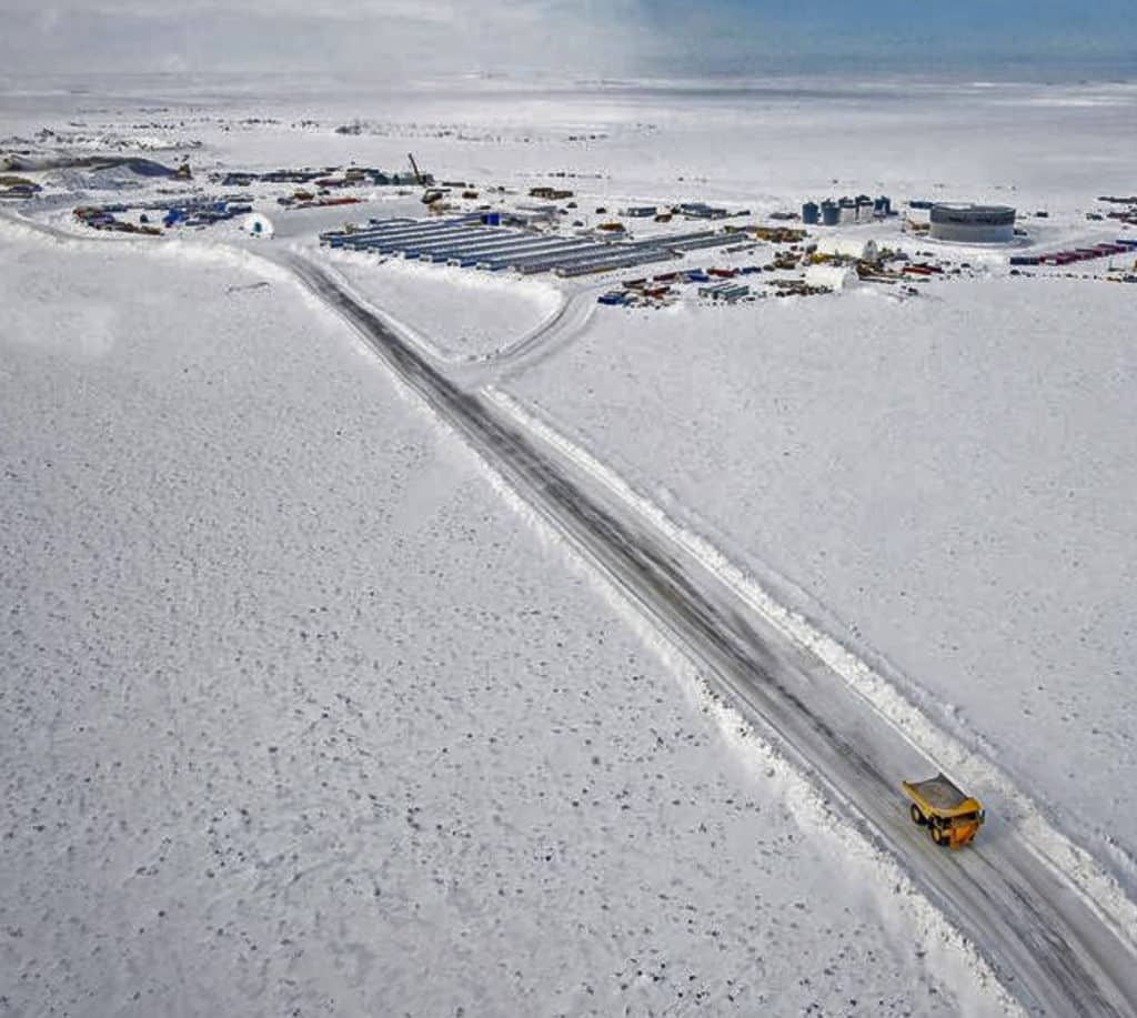 A tractor drives in a diamond mine
